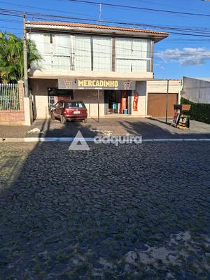 Sobrado à venda em Uvaranas,  contendo comercial no térreo e residencial na parte superior, Ponta G